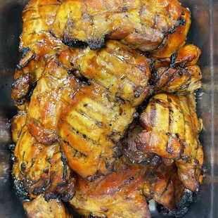 a close up of chicken wings