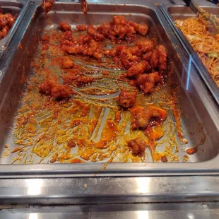 empty orange chicken, waiting for more