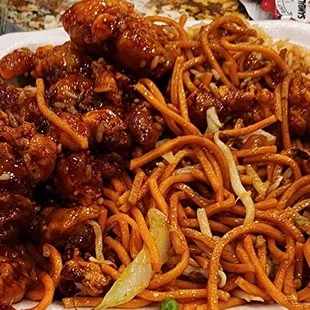 noodles and meat in a styrofoam container