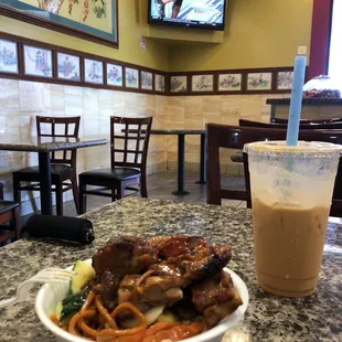 Enjoing food drinking a thai chi and watching TV!:)