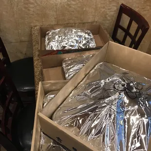 a box of scissors and a pair of scissors