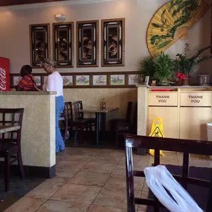 a man standing in a restaurant