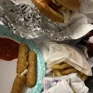 a hamburger, fries, and ketchup