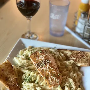 Salmon on Alfredo pasta