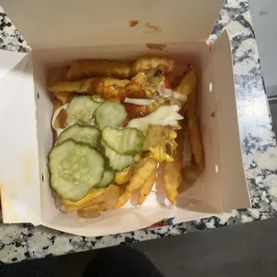 a box of fries and a cucumber