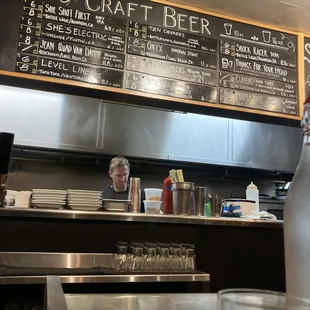  man working in a craft beer shop