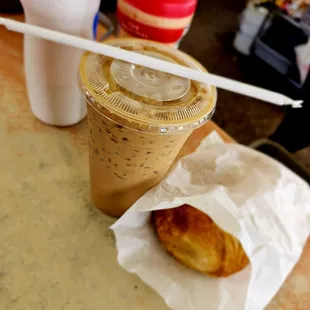 My typical Vietnamese ice coffee and ham and cheese croissant.