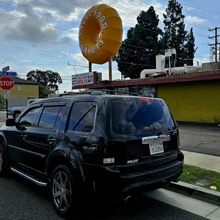 Entrance to the big donut factory .