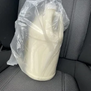 Large jug of fresh sweetened soy milk