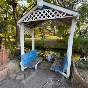 a gazebo and a pond