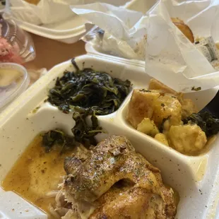 Baked chicken greens cheese and potatoes