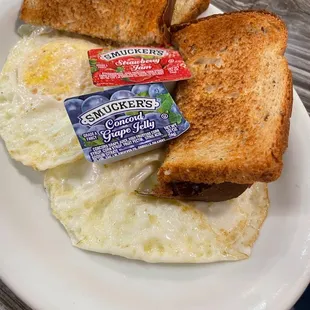 Two Eggs any style , toast &amp; jelly