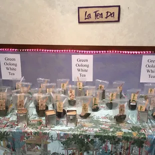 a table with a variety of teas