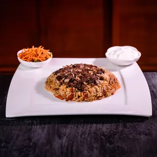 Uyghur Pilaf
Rice Steamed with Carrots and Lamb. Comes with Uyghur Salad and Yoghurt.