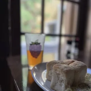 a sandwich and a glass of beer