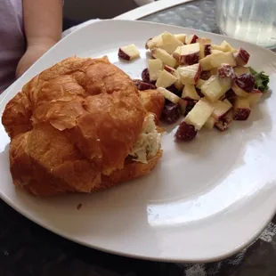 Chicken salad on croissant and Waldorf salad