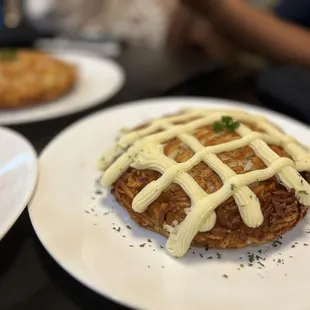 three plates of food on a table