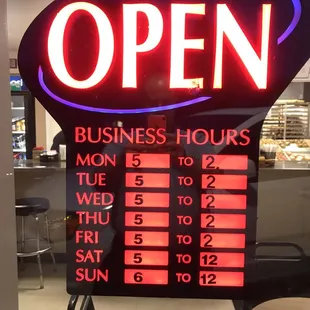 a business hours sign