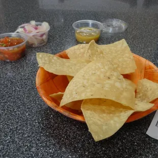 Complimentary chips and salsa. You get the salsa yourself at the salsa bar which there's a variety of options.