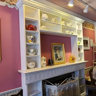 a dining room with a fireplace