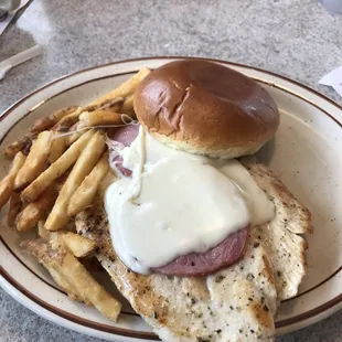 Canadian chicken sandwich with a side of fries.