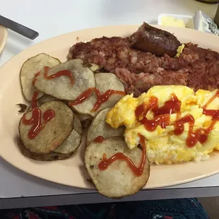 Cornbeef hash, potatoes with eggs and cheese