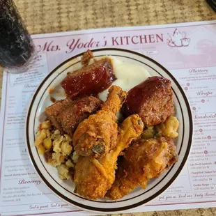 Chicken, meatloaf, mashed potatoes, corn, and stuffing