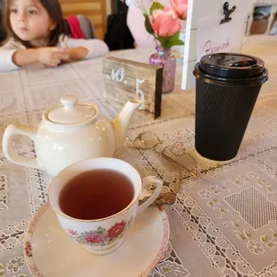 Dragons breath tea in-house or hot chocolate to-go cup for a child.