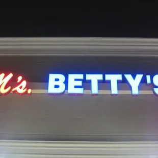 a neon sign for mrs betty&apos;s