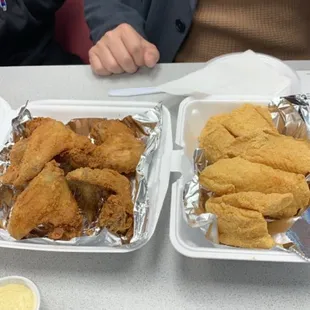 two trays of fried chicken