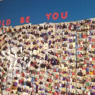 a wall full of photos
