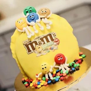 a cake with m &amp; m&apos;s on top