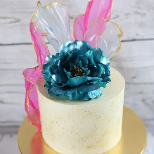 a cake with a flower on top