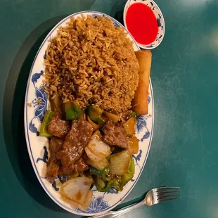 Beef with Peppers and Onions, Fried Rice, Egg Roll. All very tasty and the serving is huge.