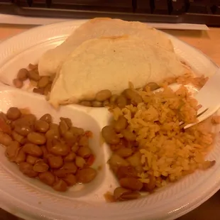 This is a taco plate. You get two tacos of carne guisada or chicken guisado, rice and beans for like $5. Good stuff!