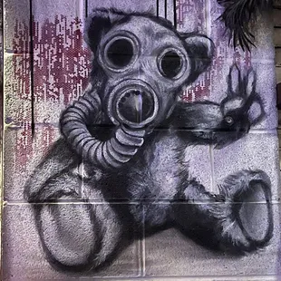 a bear with a gas mask