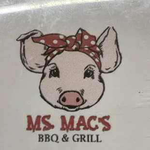 a pig with a bandana