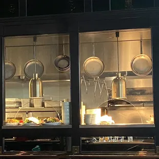 This size of the kitchen is so quaint and the put beautifully plated food out constantly