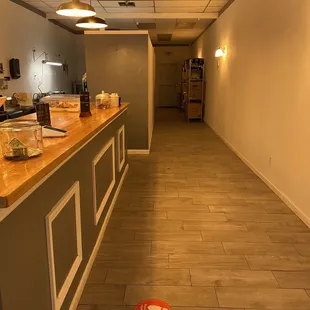 a kitchen with a red floor