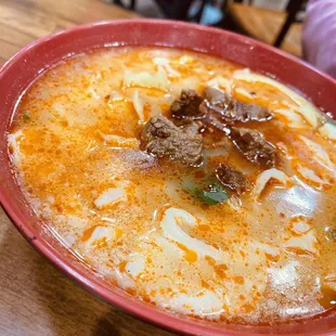 a bowl of soup on a table