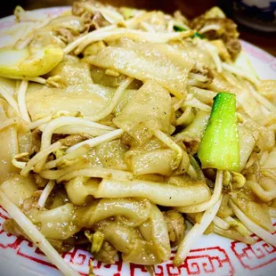 a plate of stir fried noodles