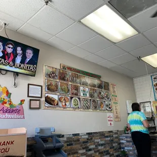 a woman standing in front of the counter