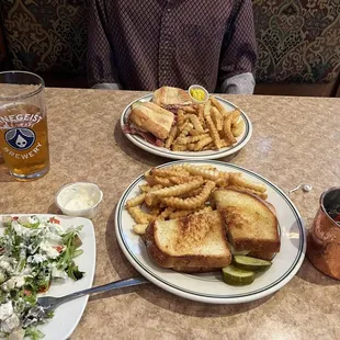 Top: Eduardo 's Italian Hoagie Sandwich / Truth Bottom: Side Salad with Blue Cheese/ Southwestern Chicken Sandwich/ Moscow Mule