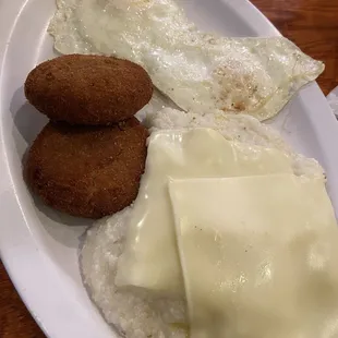 Salmon croquettes eggs and cheese grits