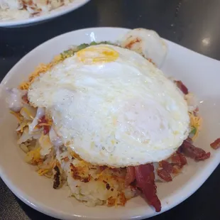 two plates of breakfast food