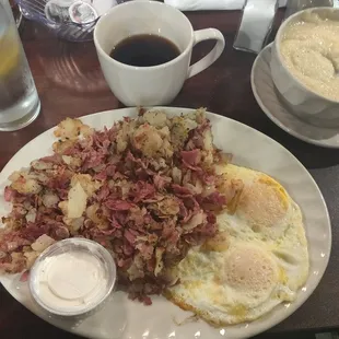 Corned beef hash and eggs! Side of grits with cheese.