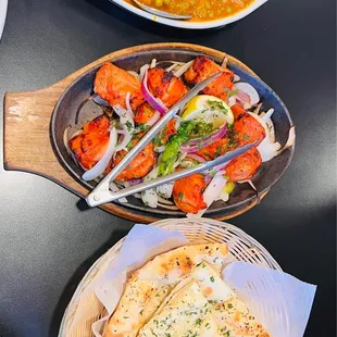 Mushroom Mattar Masala  $14.99 Tandoori Chicken Tikka $16.99 Garlic Naan $3.99