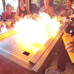 The grill being turned on