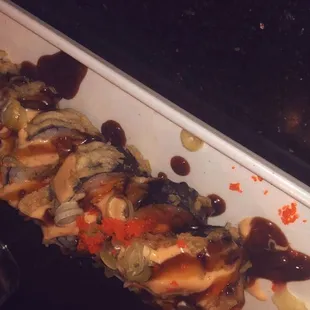 a close up of a roll of sushi