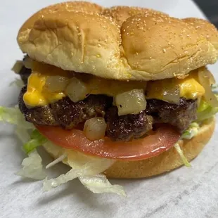 Deluxe Burger $7.50 make it a double add $2.75.